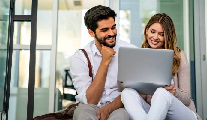 happy-young-couple-working-studying-on-laptop-and-2022-06-17-01-39-35-utc (1)